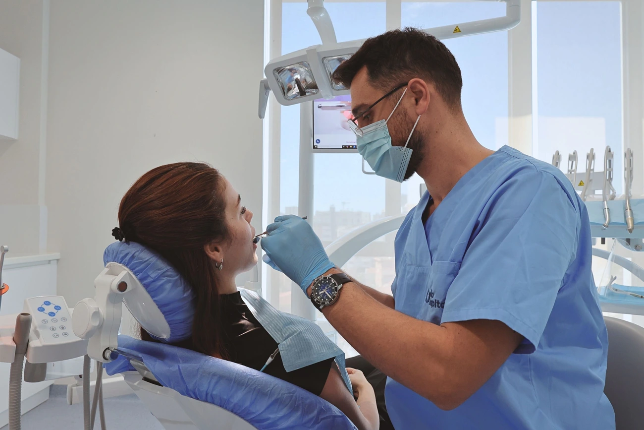 Dentist treating a patient at Trita Dent